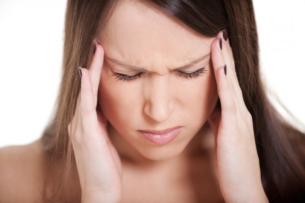 young woman with migraine